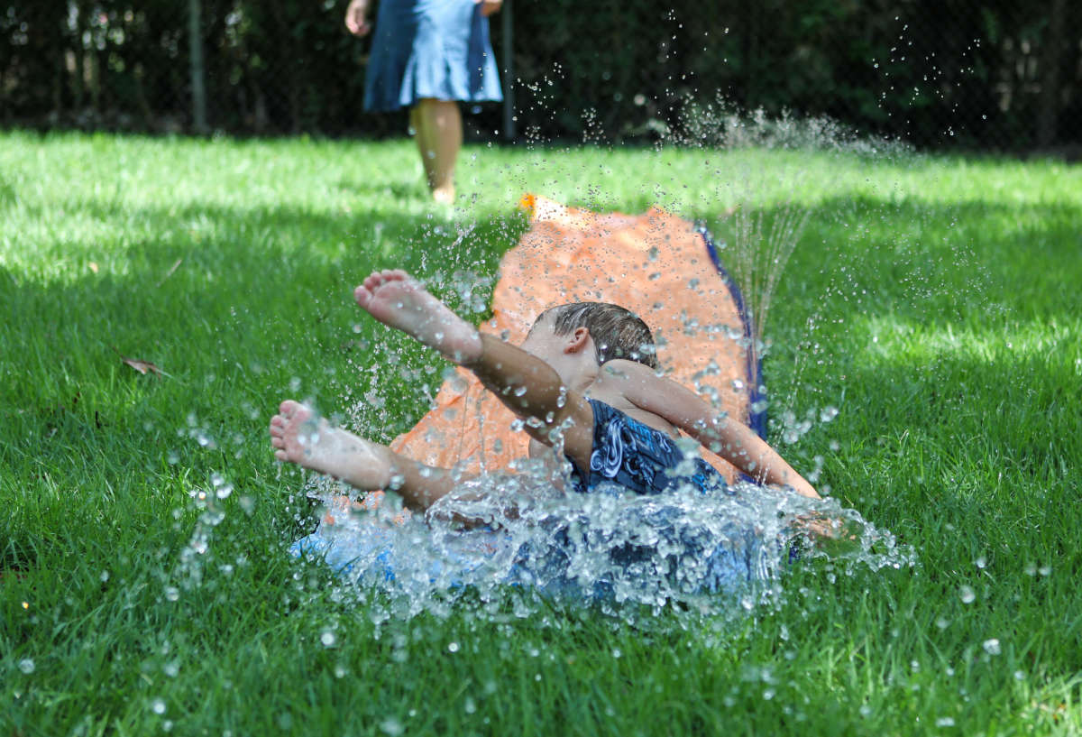 kid on water slide 