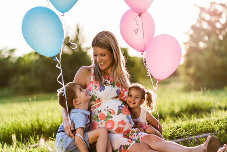 gender reveal party balloons with kids