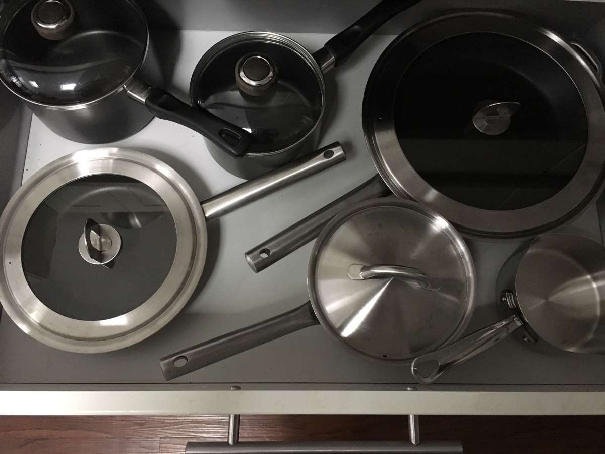 Organize your kitchen by storing pots and pans