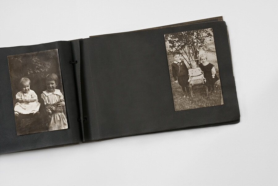 Antique photo album on white background