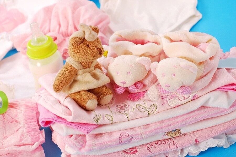 Pile of pink baby supplies