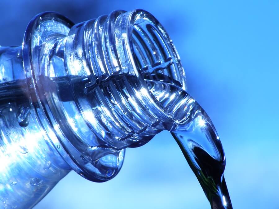 Close up of water bottle pouring water