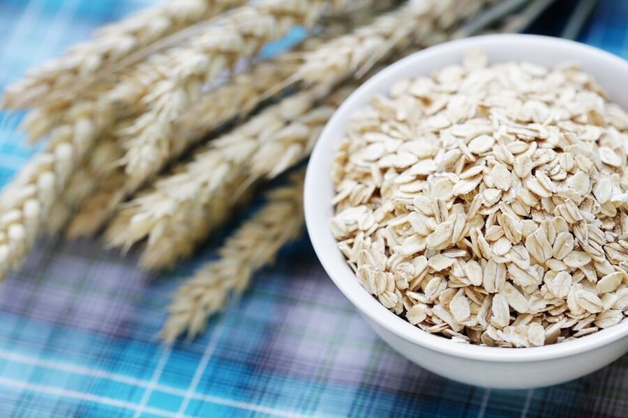 Bowl of oats on blue tablecloth