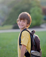 Youngboyreadyforschoolwithbookbag