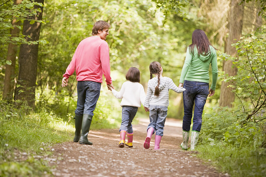 Tips for Learning Outside of School, Parents and two daughters hiking for quality time