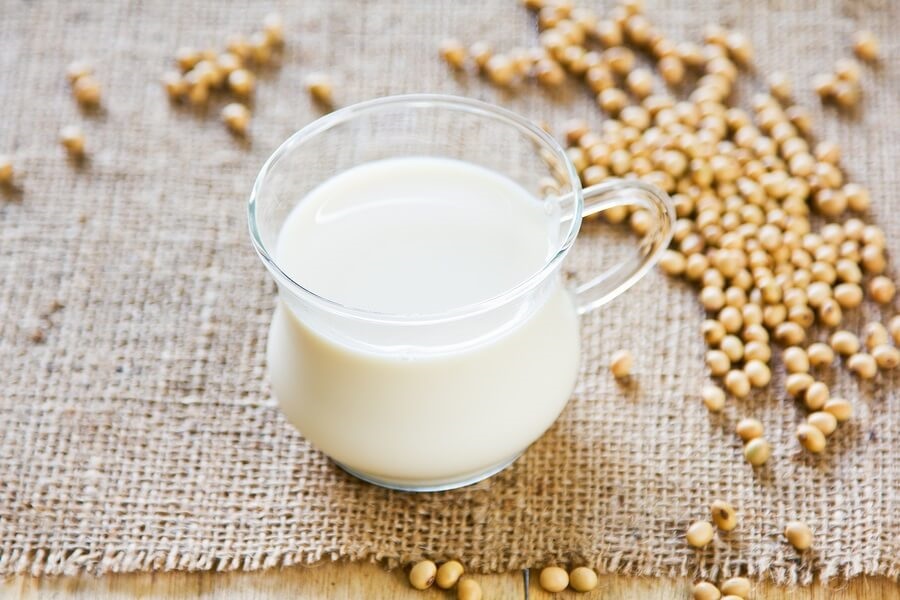 Glass of soy milk and soy beans