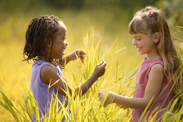 Girls playing in field