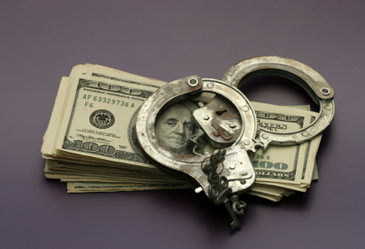 moneyandhandcuffs,corruptmoney