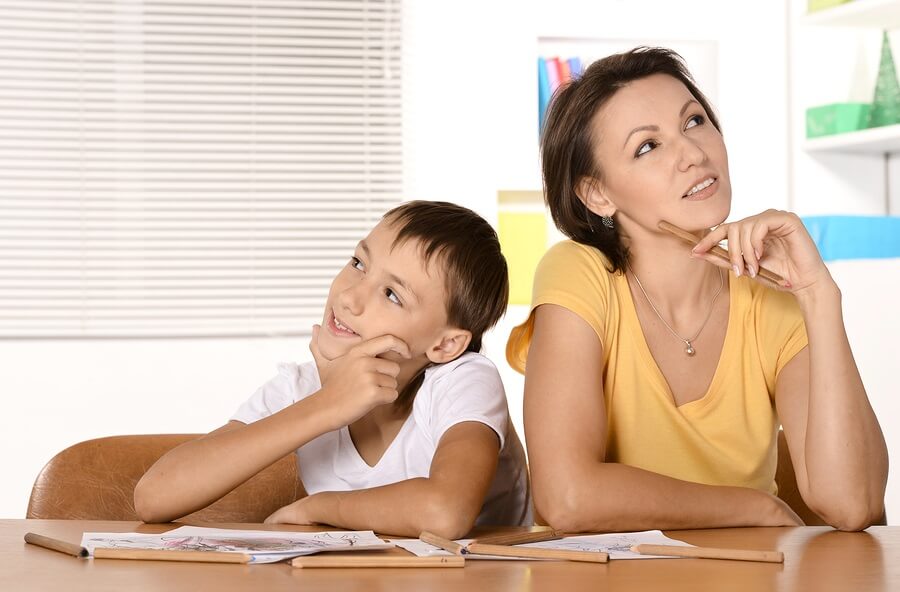 Mother and Son Solving Math Problem