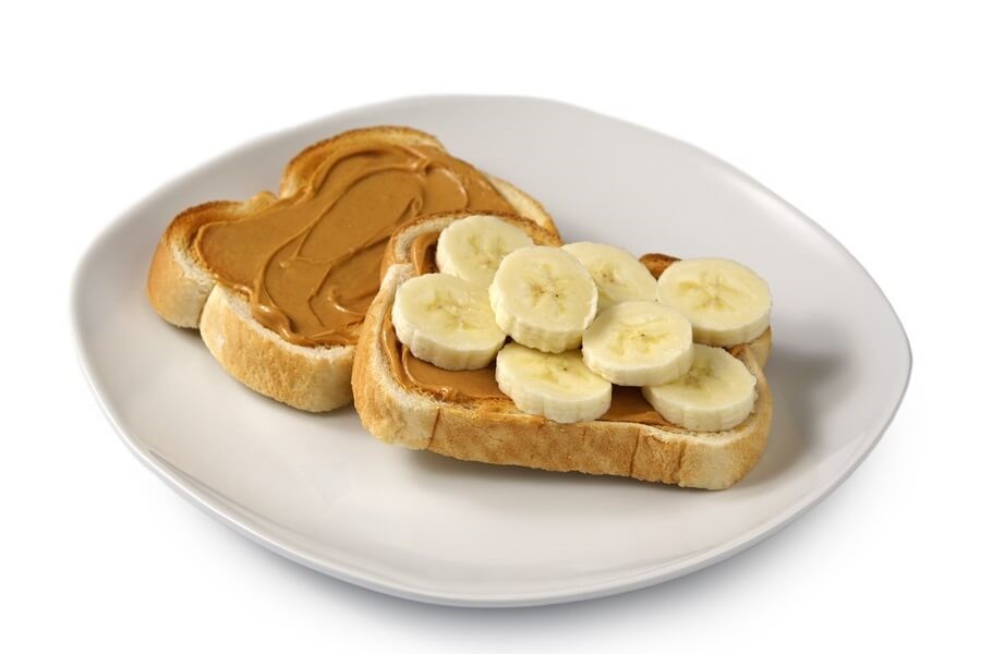 Toast topped with peanut butter and banana