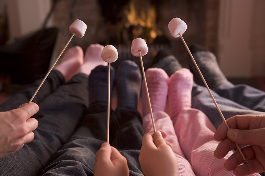 Roasting marshmallows in front of the fireplace