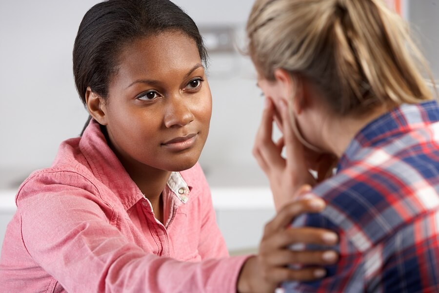 Sad teen in therapy session