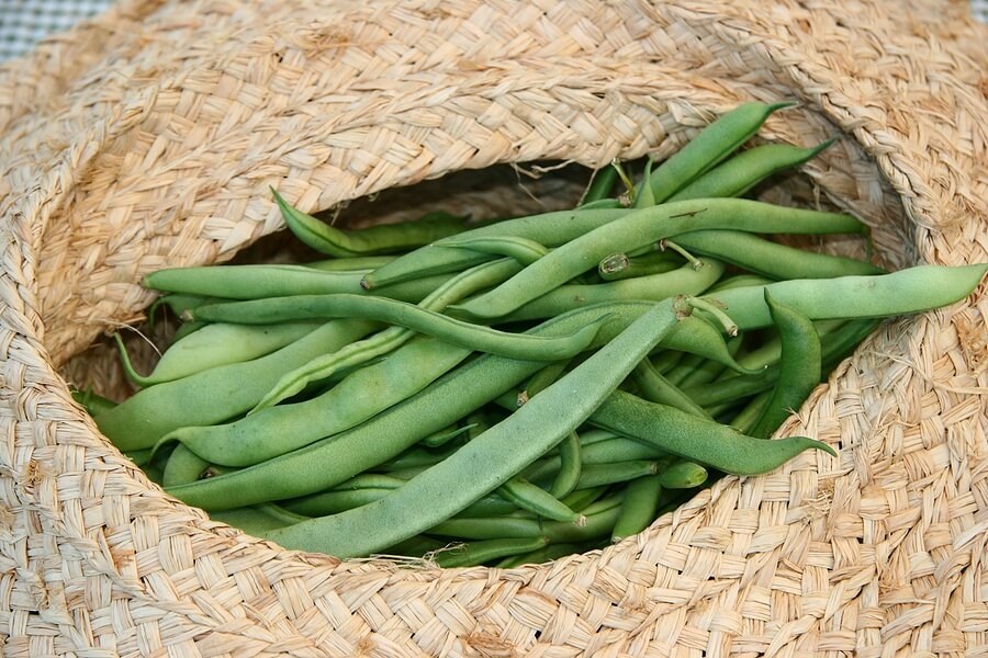 String beans in a woven basket