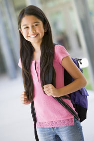 Younggirlstudentwithbookbag