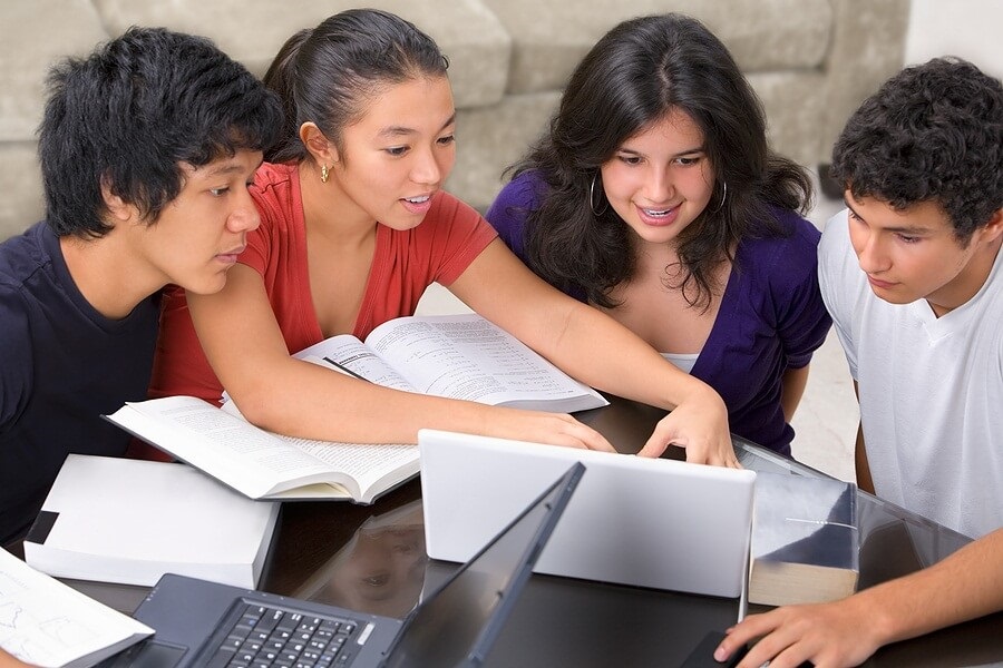 Group of students reviewing class notes