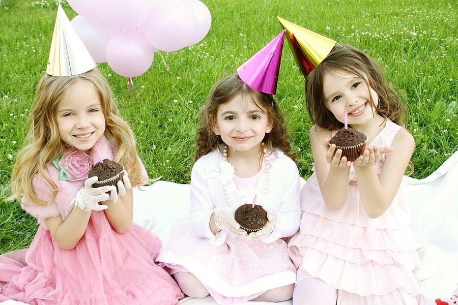 Little girls dressed up at birthday party