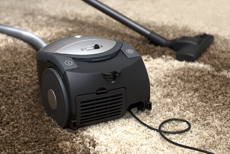 Vacuum on top of dirty carpet