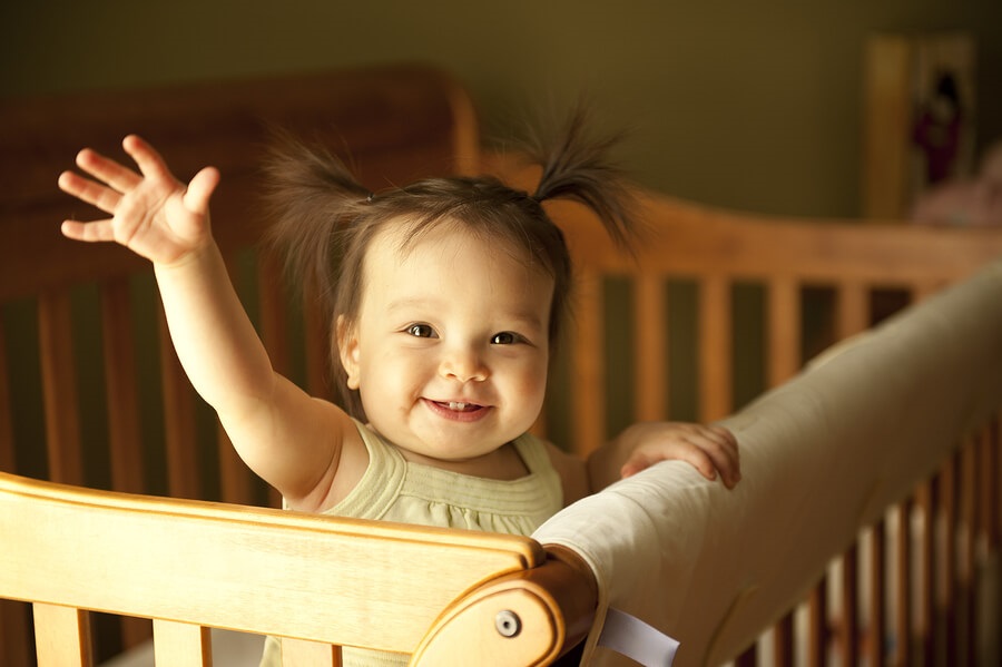 baby in darkened room