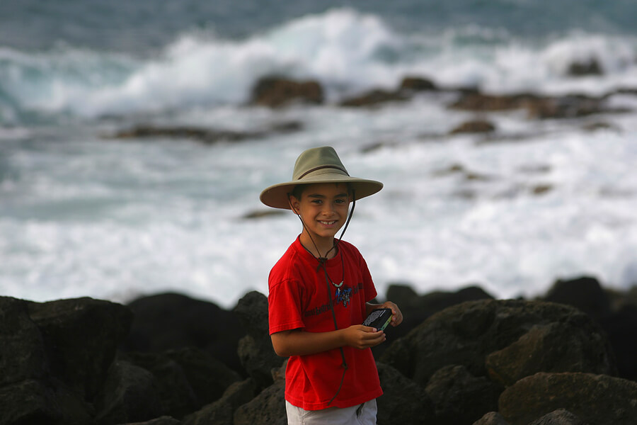 Summer camp essentials, boy in beach hat