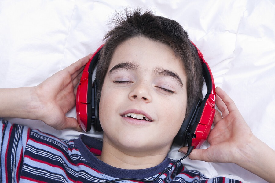 boy listening to relaxing music