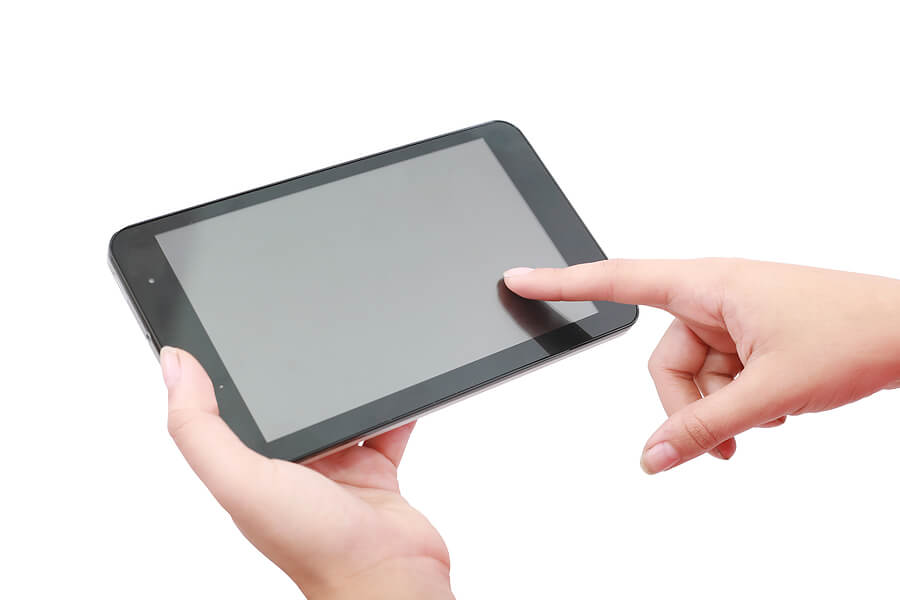 Mothers Day gift, womans hands holding eReader tablet