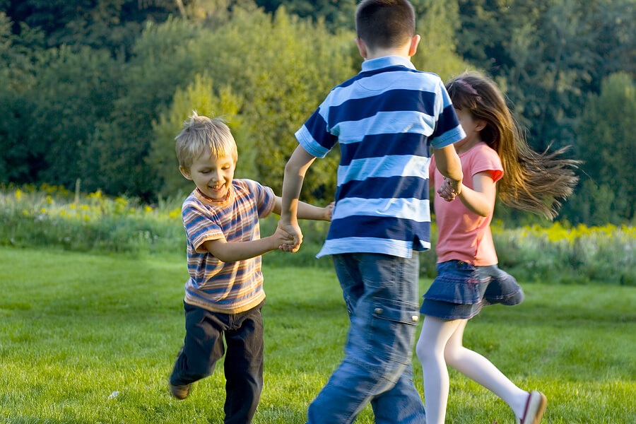 Fun Family Fitness, Three kids dancing outside for exercise