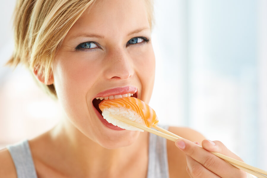 me time idea, woman eating sushi