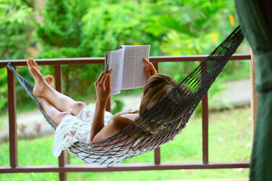Thoughtful Mothers Day gift, woman reading in a hammock