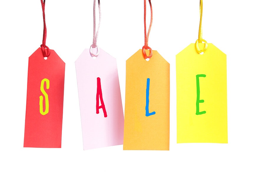 Fundraising ideas, four colorful tags spelling out SALE