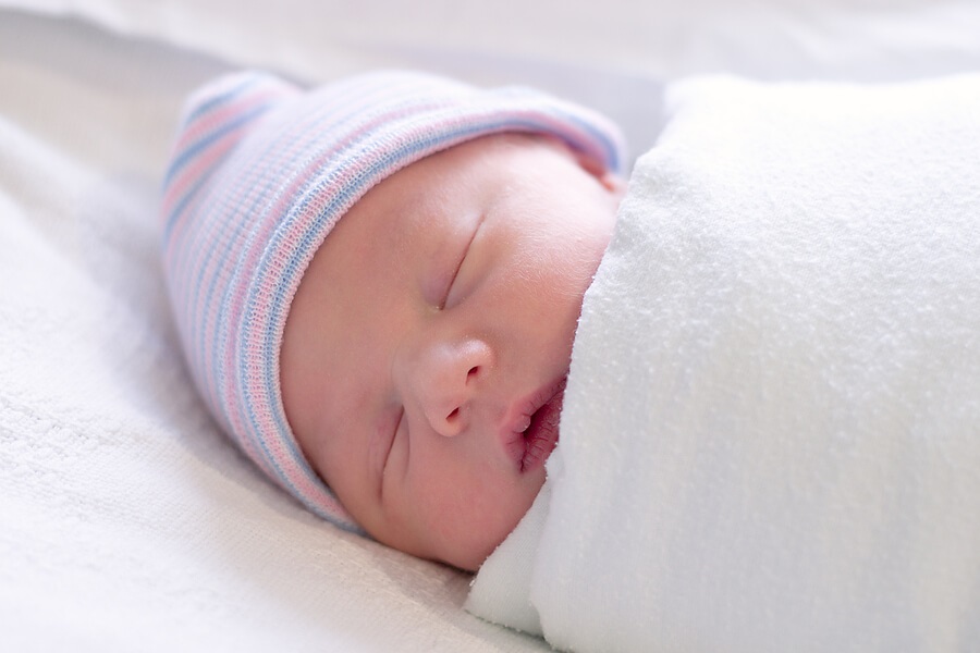 swaddled newborn sleeping