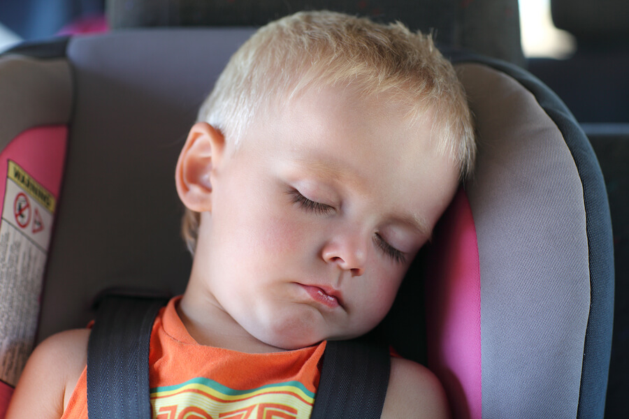 baby sleeping in car