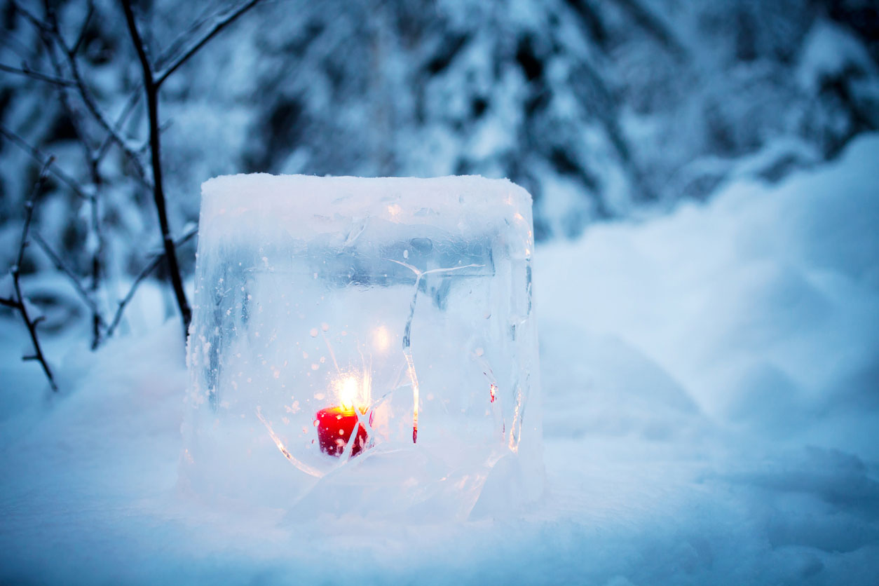 ice candle in snow