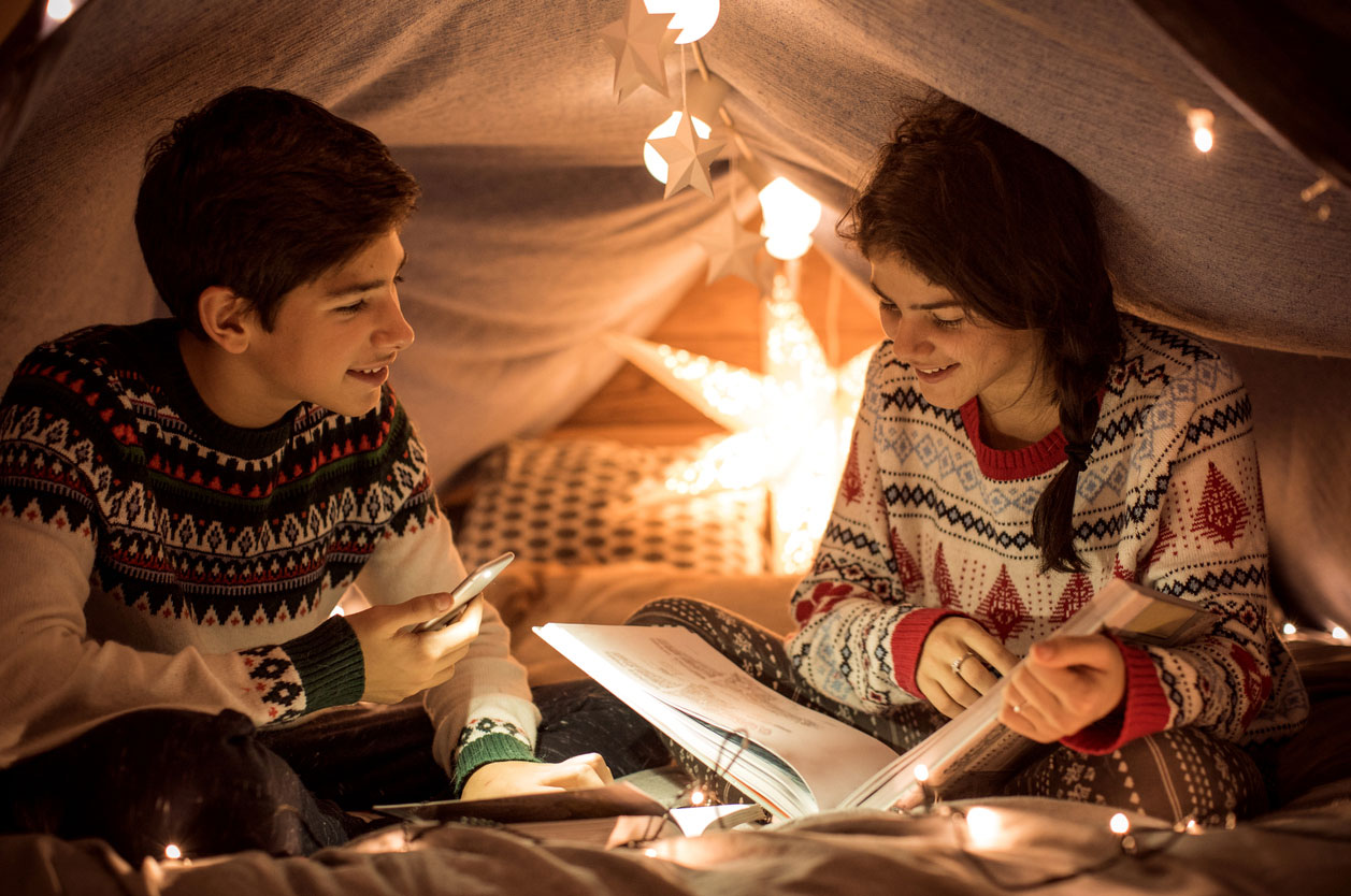 kids reading in tent