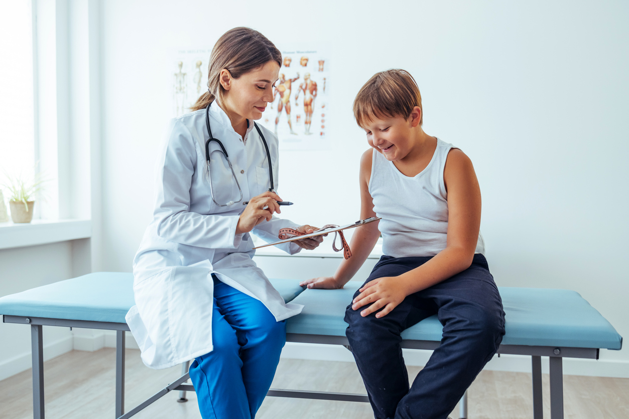 Boy Receiving Check up with the Doctor