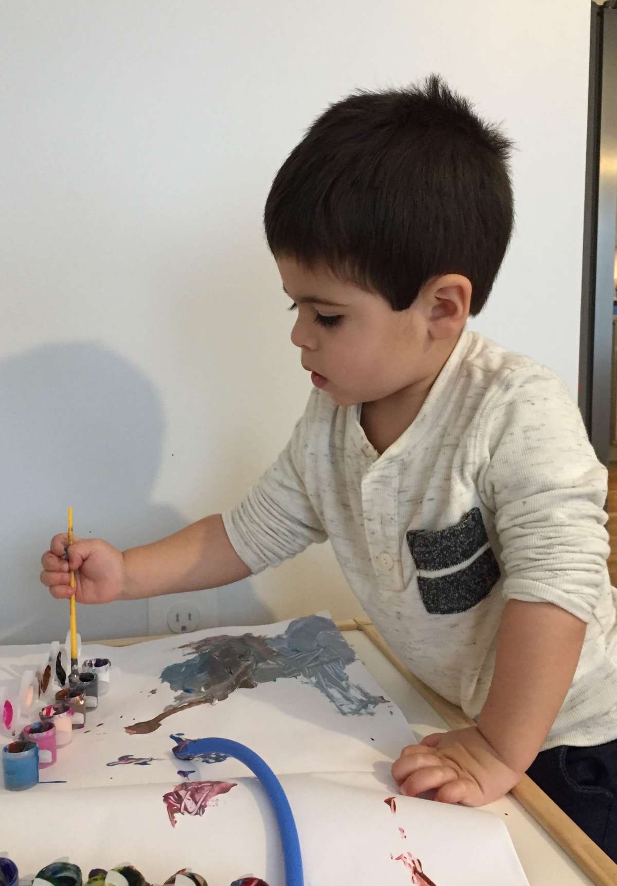 Little Boy Painting