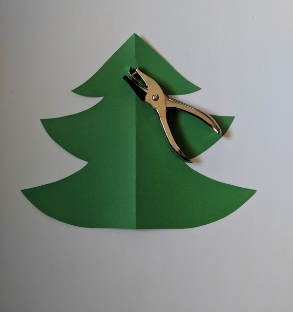 Cut out of green paper Christmas Tree craft 