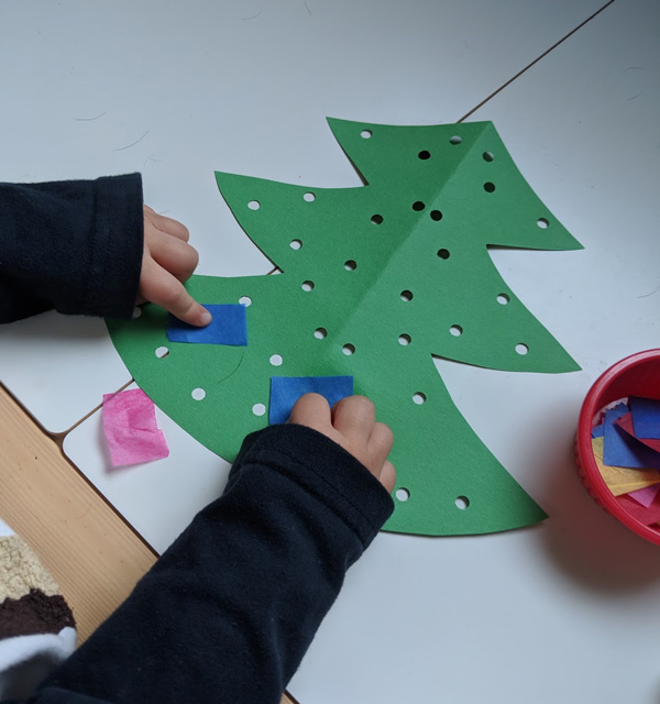 Paper Christmas Tree Craft with pasted tissue paper pieces