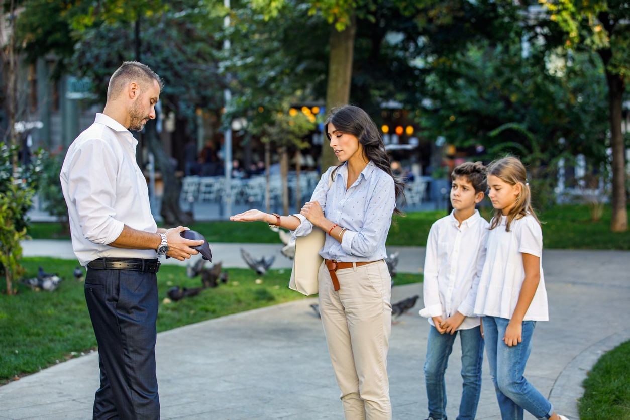 Divorced parents meet in neutral place for kids to switch houses. Spousal support after divorce.