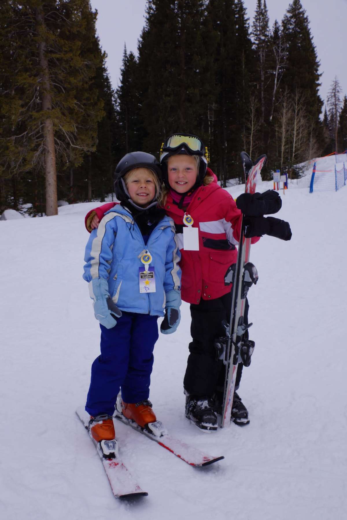 Two Kids Skiing