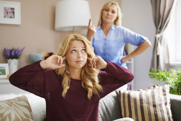 teenage daughter defying parent's rules