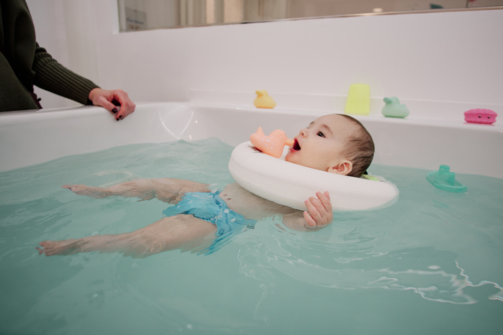 baby floating in the bath 