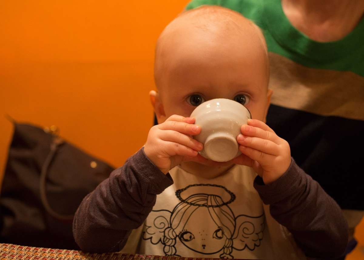 Practice with cups to help your baby wean