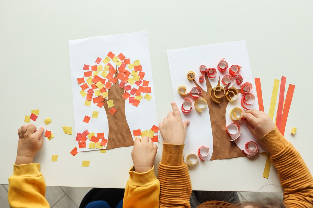 Arts and crafts project by kids representing fall trees. 