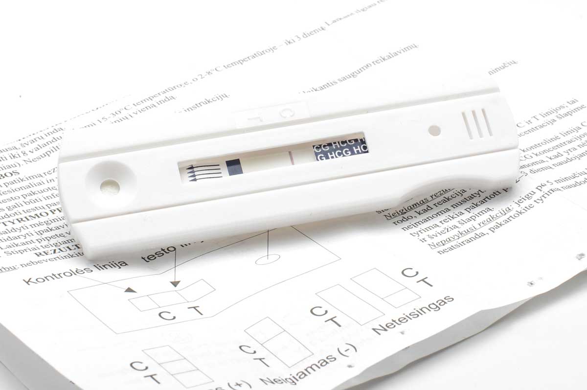 negative pregnancy test with instructions in back