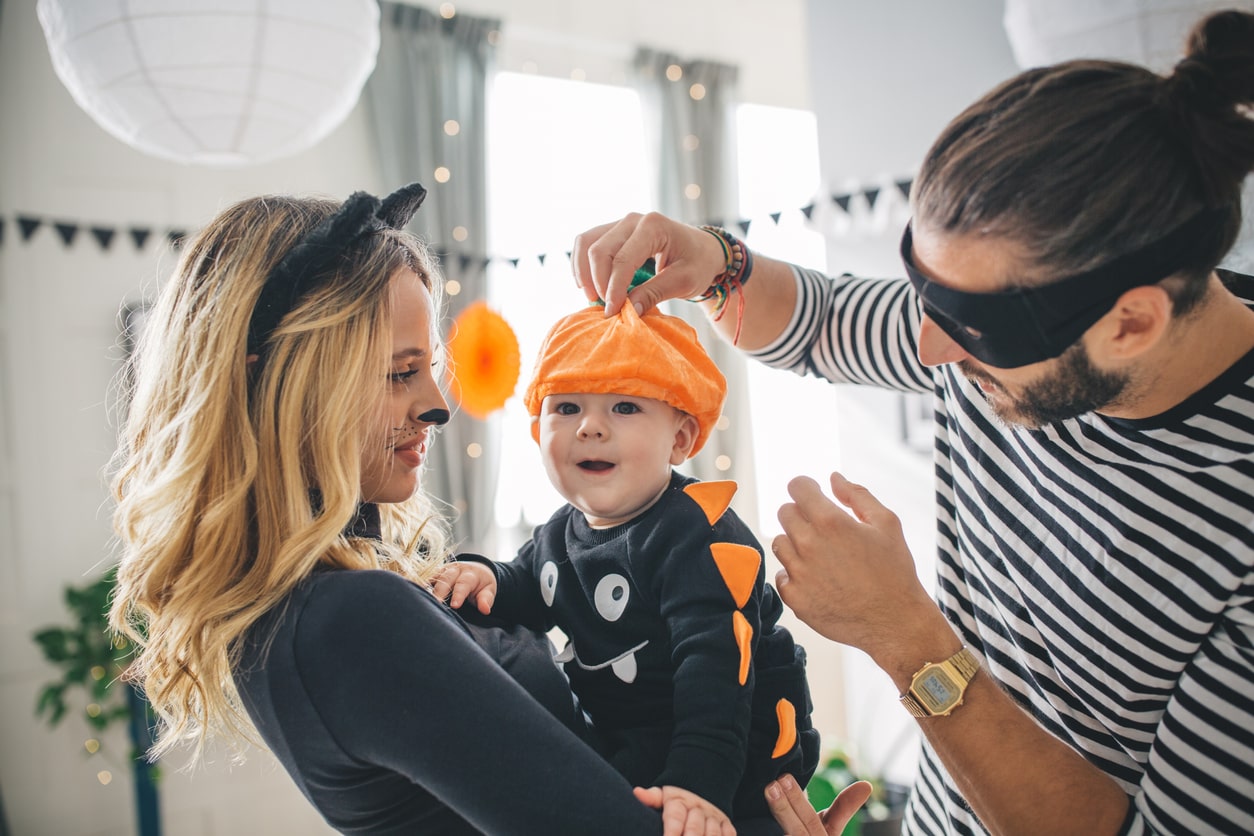 Couple with baby dress up for halloween 2023