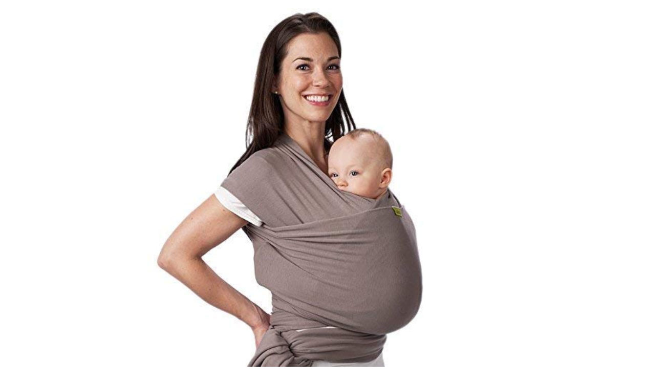 mom wearing baby wrap carrier in gray