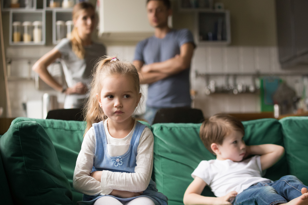 Frustrated kid girl feels upset, offended or bored ignoring avoiding worried parents and brother