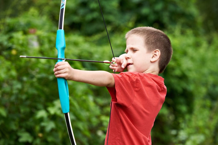 Kid with bow and arrows