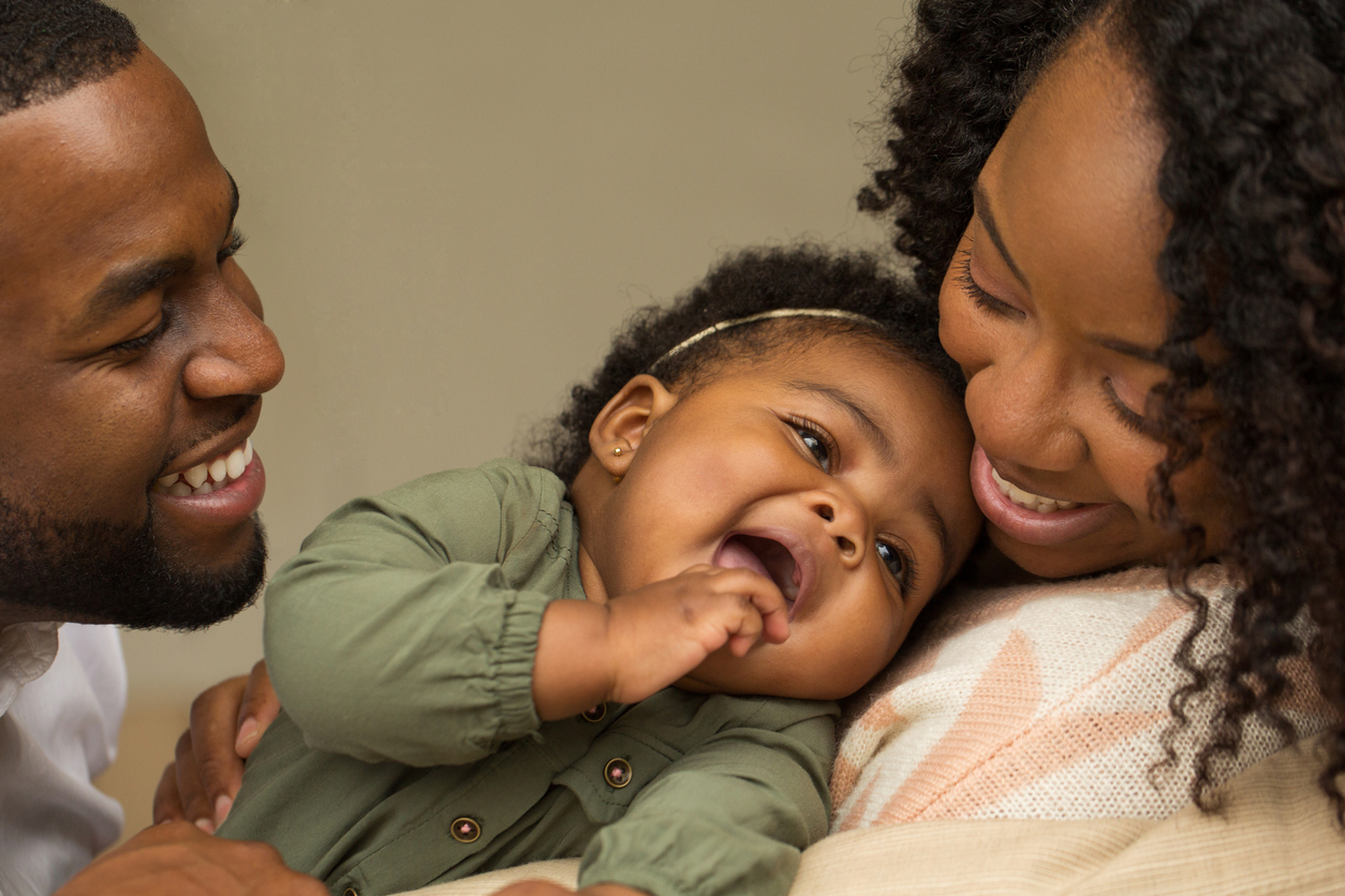 Young baby with parents