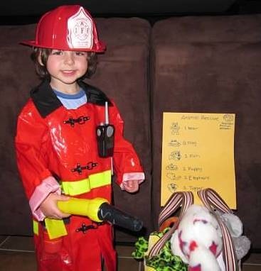 Little Kid Dressed Up as Fireman